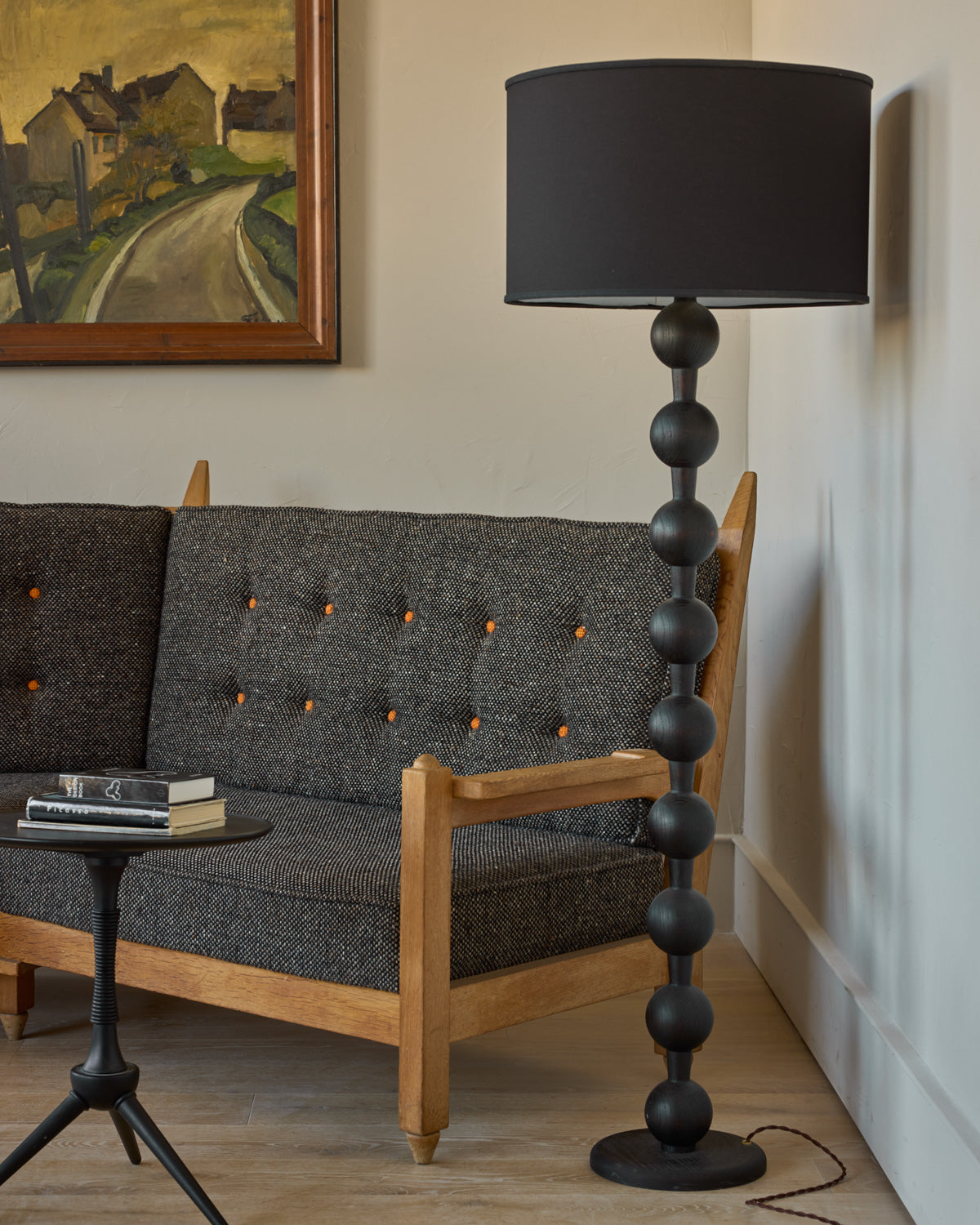 Tall sculptural solid red oak floor lamp with barbell design in dark wash finish with ivory linen drum shade
#color_dark wash red oak
#shade-color_black linen