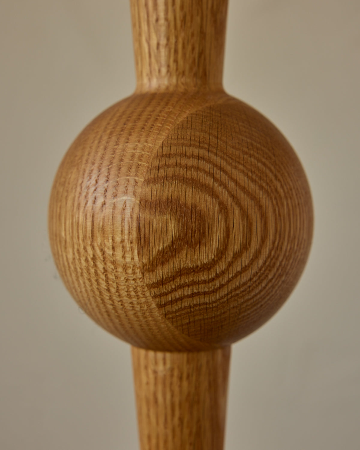 Tall sculptural solid red oak floor lamp with barbell design in natural finish with ivory linen drum shade, best seller, made in the USA
#color_natural red oak