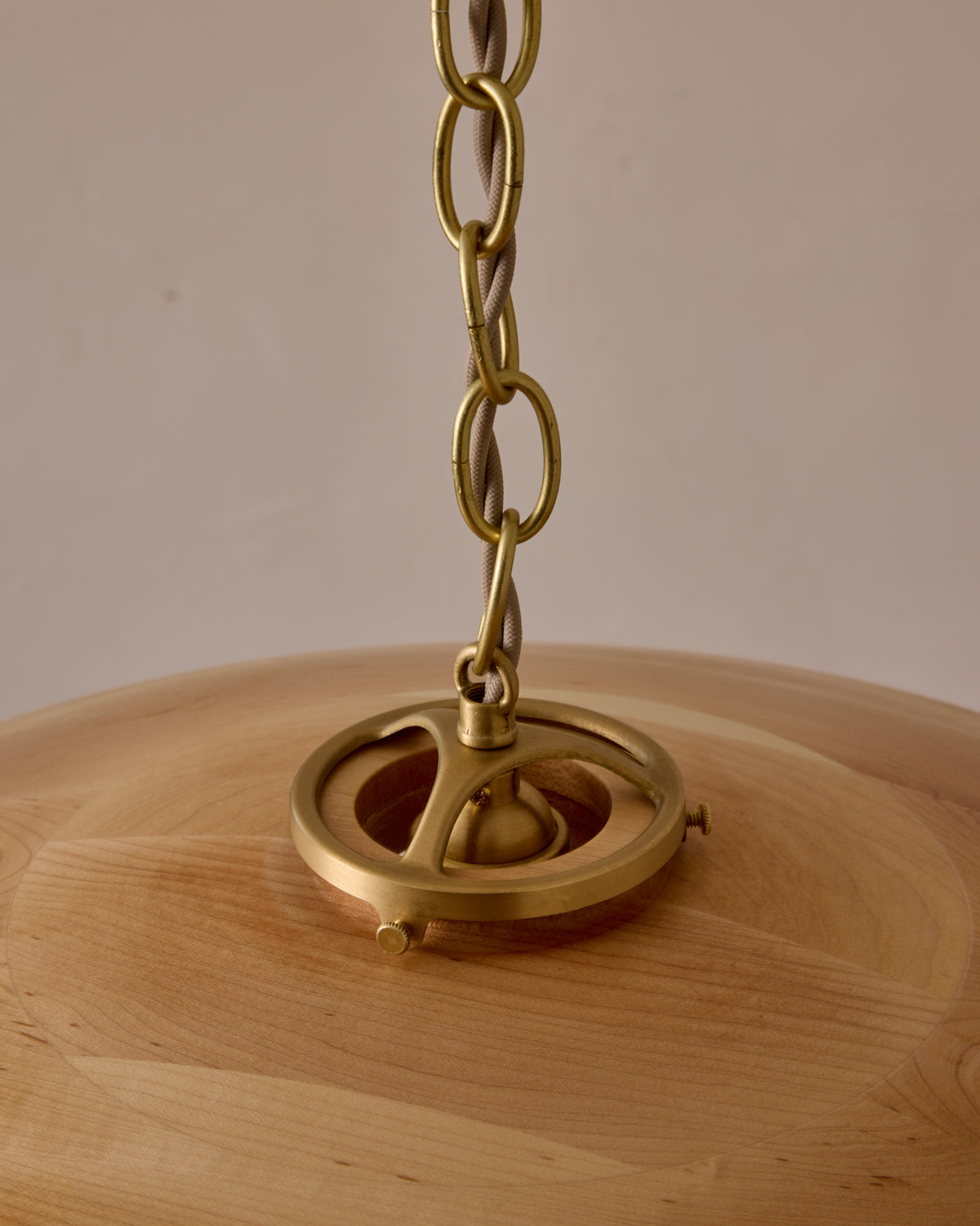 Large pendant light with oversized clear glass globe and decorative wooden clear maple shade with brass chain #shade-finish_natural maple #cord-color_beige