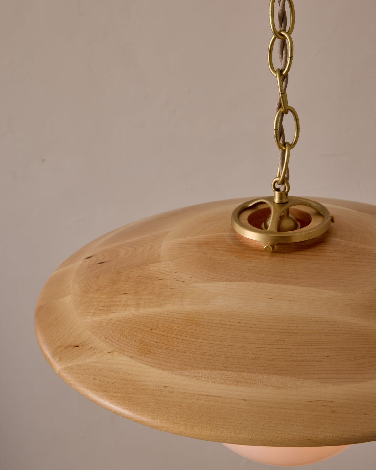 Large pendant light with oversized clear glass globe and decorative wooden clear maple shade with brass chain #shade-finish_natural maple #globe_white glass #cord-color_beige
