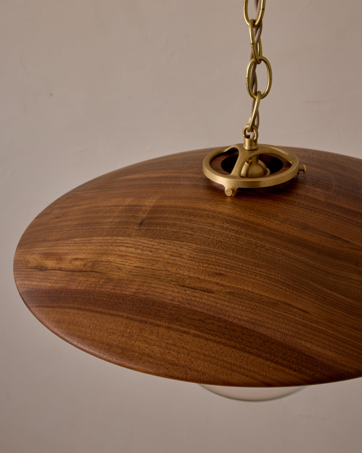 Large pendant light with oversized clear glass globe and decorative wooden clear maple shade with brass chain #shade-finish_black walnut #globe_clear glass #cord-color_beige