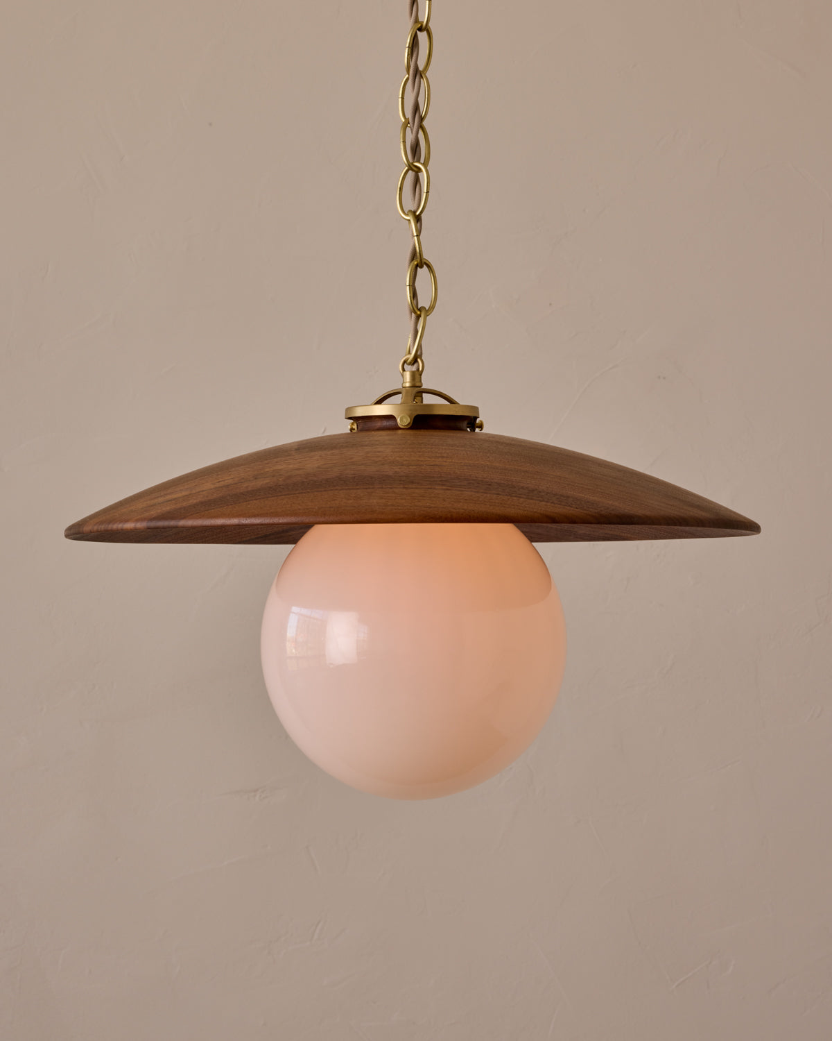 Large pendant light with oversized clear glass globe and decorative wooden clear maple shade with brass chain #shade-finish_black walnut #globe_white glass #cord-color_beige