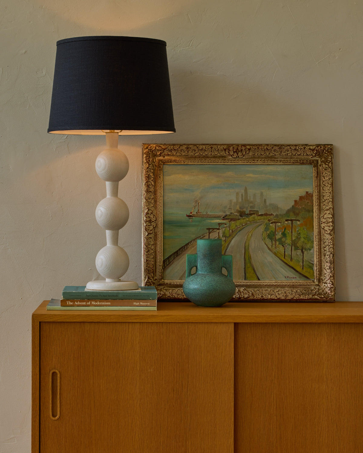 Sculptural solid wood table lamp with barbell design in white wash finish with black linen shade #wood-finish_white wash red oak #shade-color_black linen