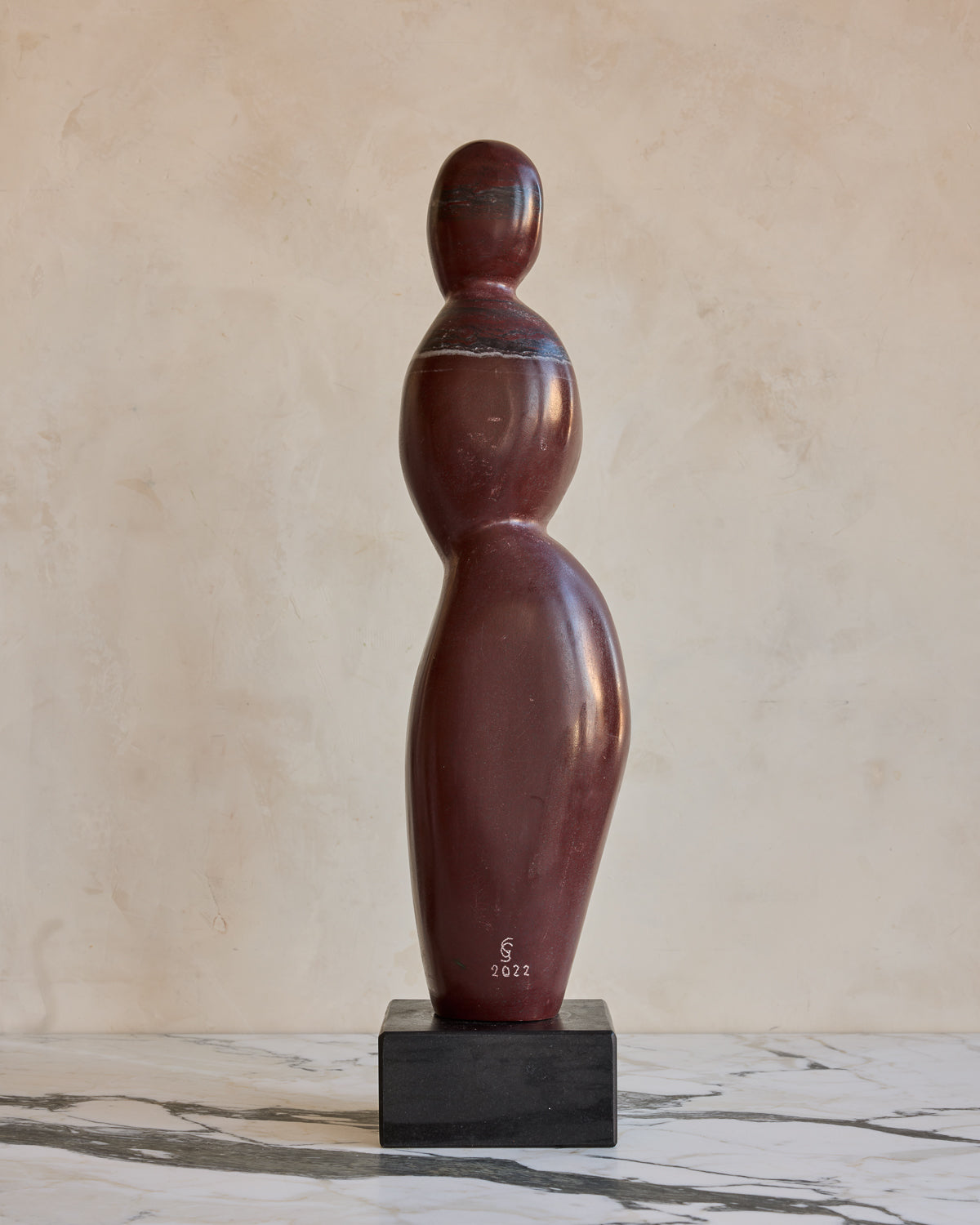 Red Marble Figure Sculpture