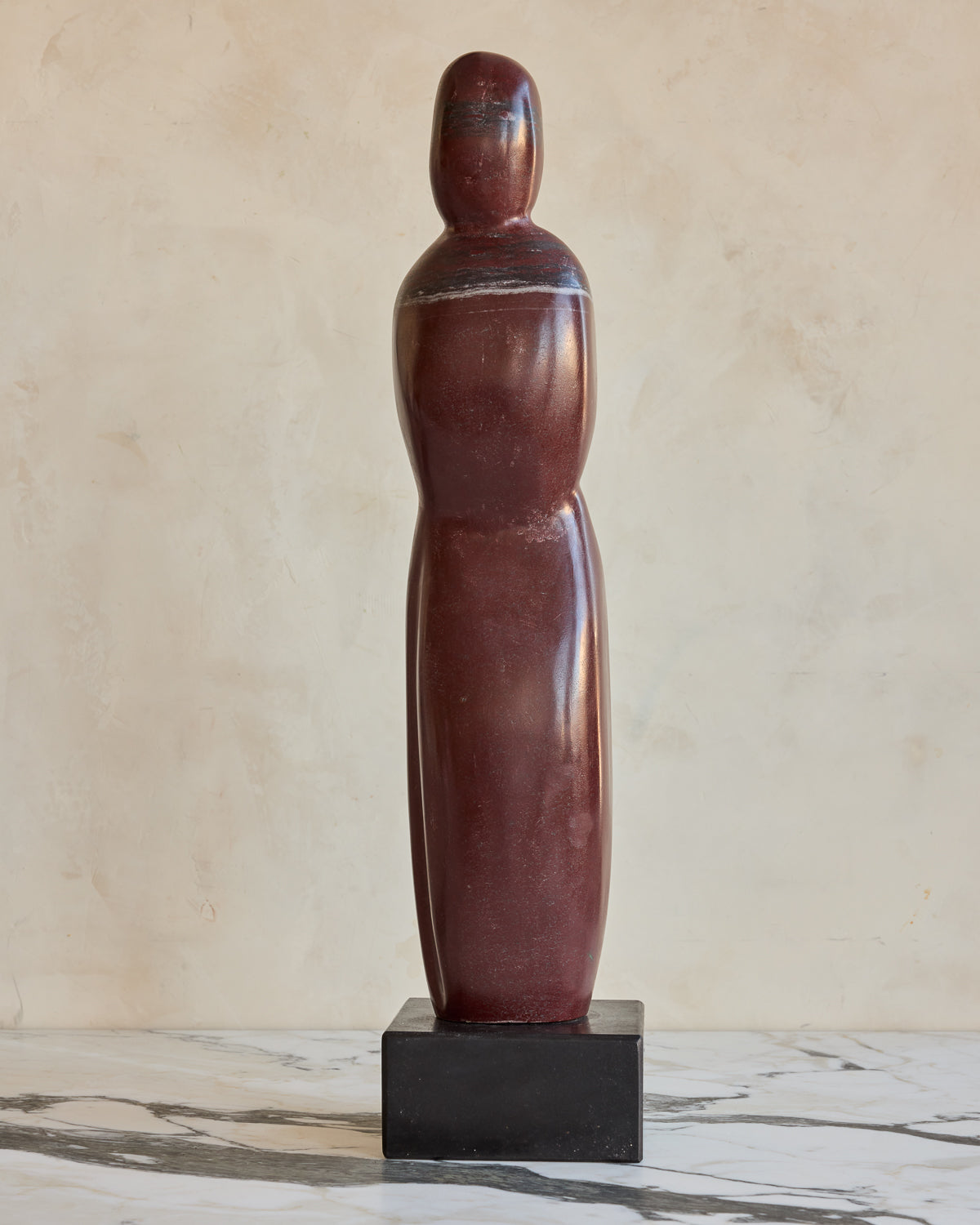 Red Marble Figure Sculpture