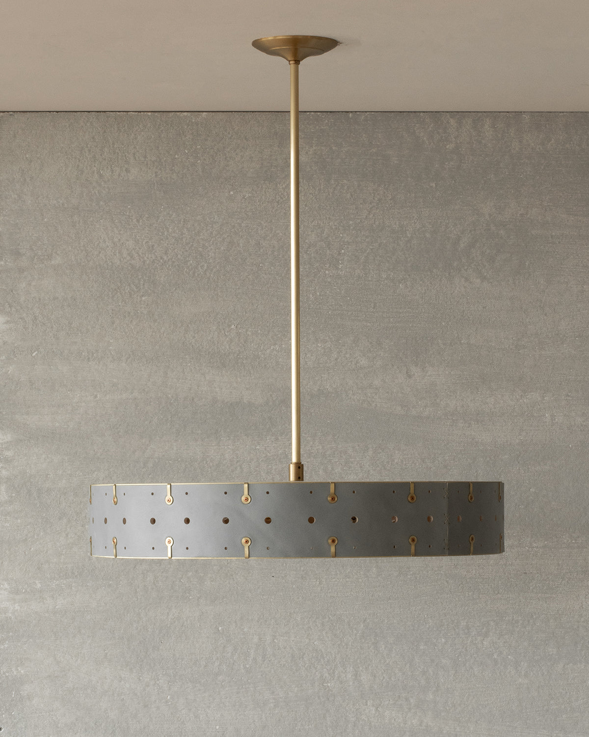 Beautiful satin brass ceiling pendant fixture with handstitched leather drum shade and customizable drop
#leather-color_cloud-blue