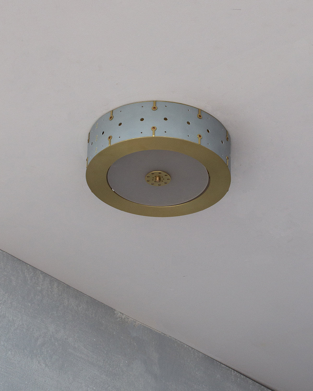 Beautiful satin brass flush mount ceiling fixture with handstitched leather drum shade #leather-color_cloud blue