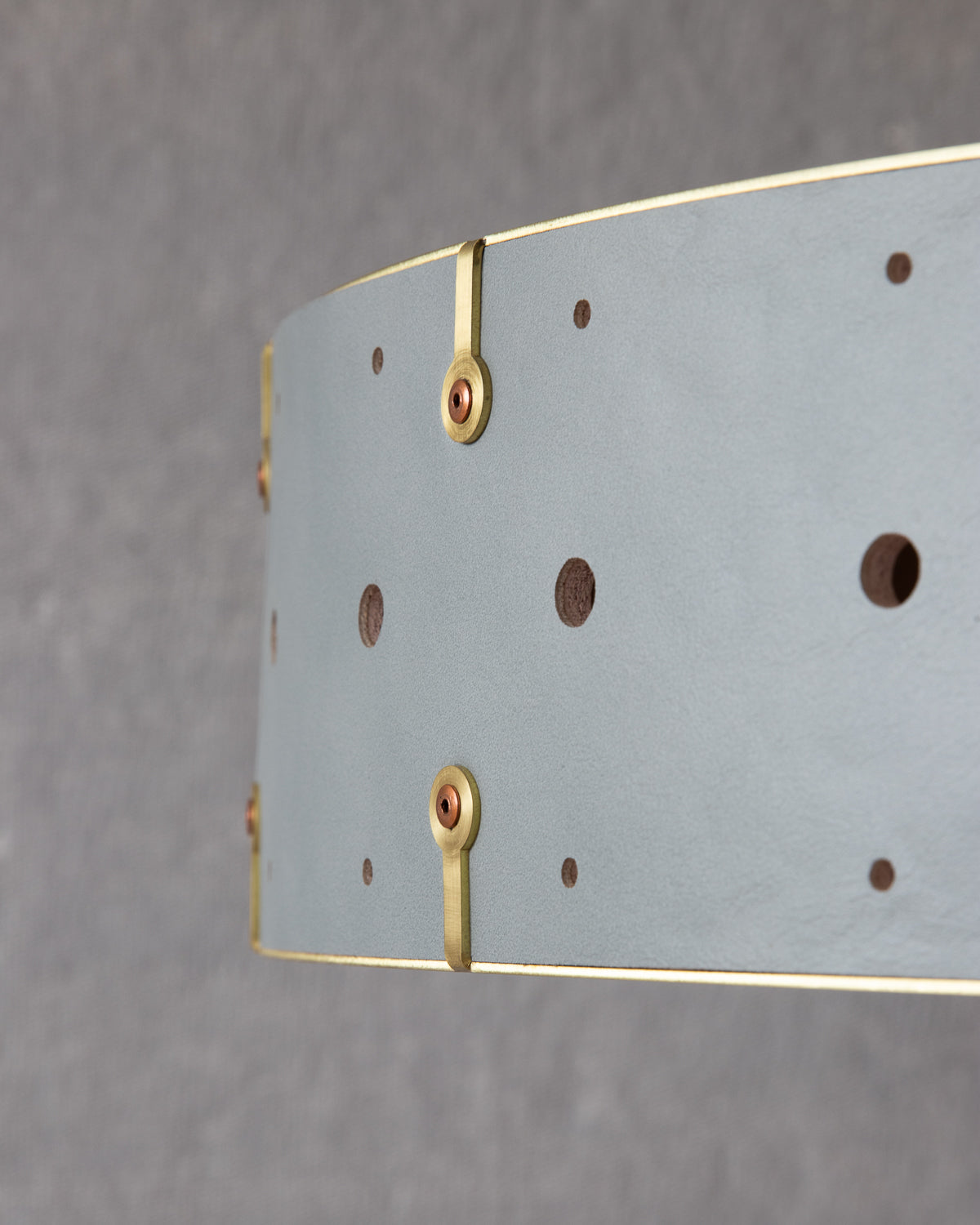 Beautiful satin brass ceiling pendant fixture with handstitched leather drum shade and customizable drop
#leather-color_cloud blue