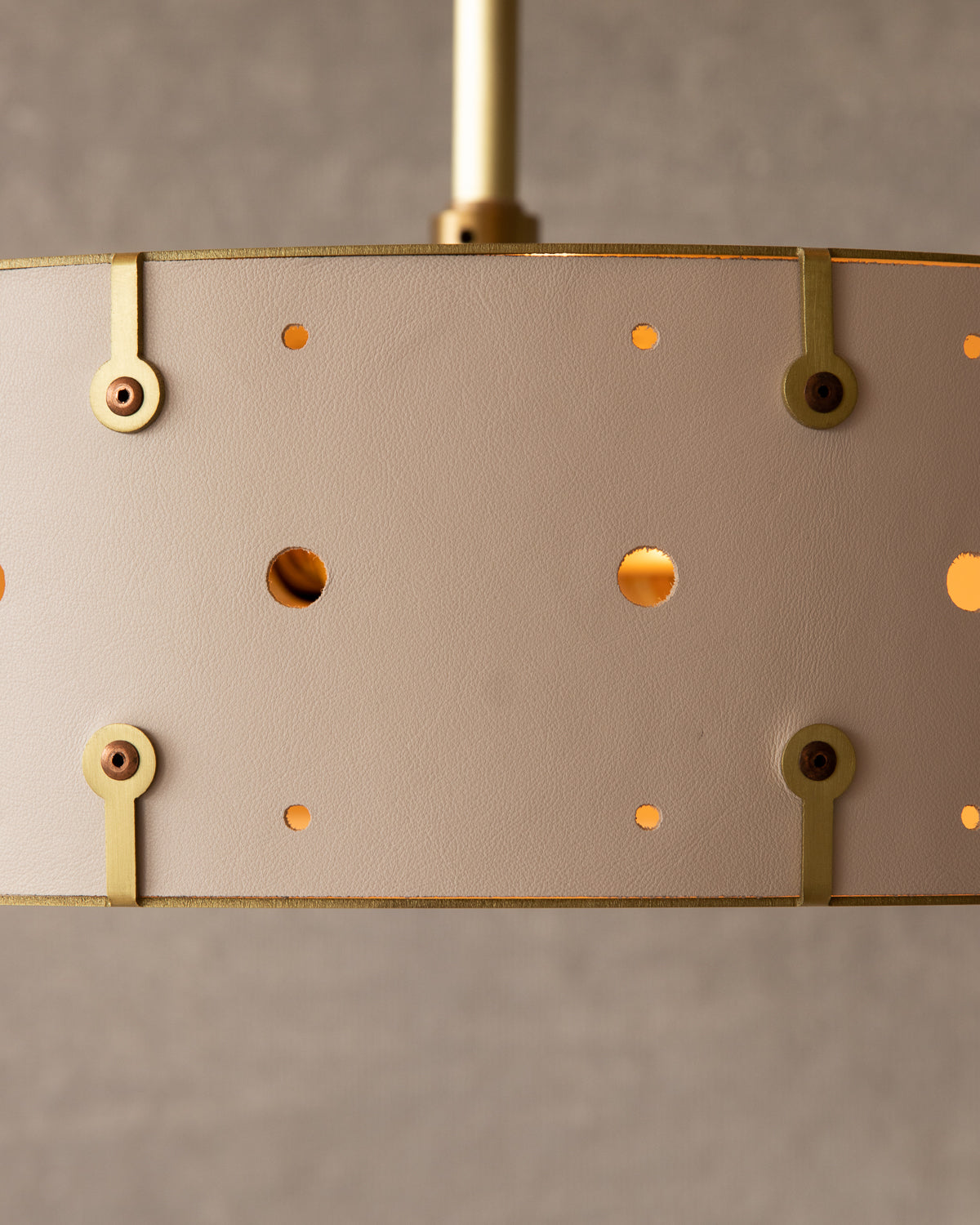 Beautiful satin brass ceiling pendant fixture with handstitched leather drum shade and customizable drop
#leather-color_dogwood