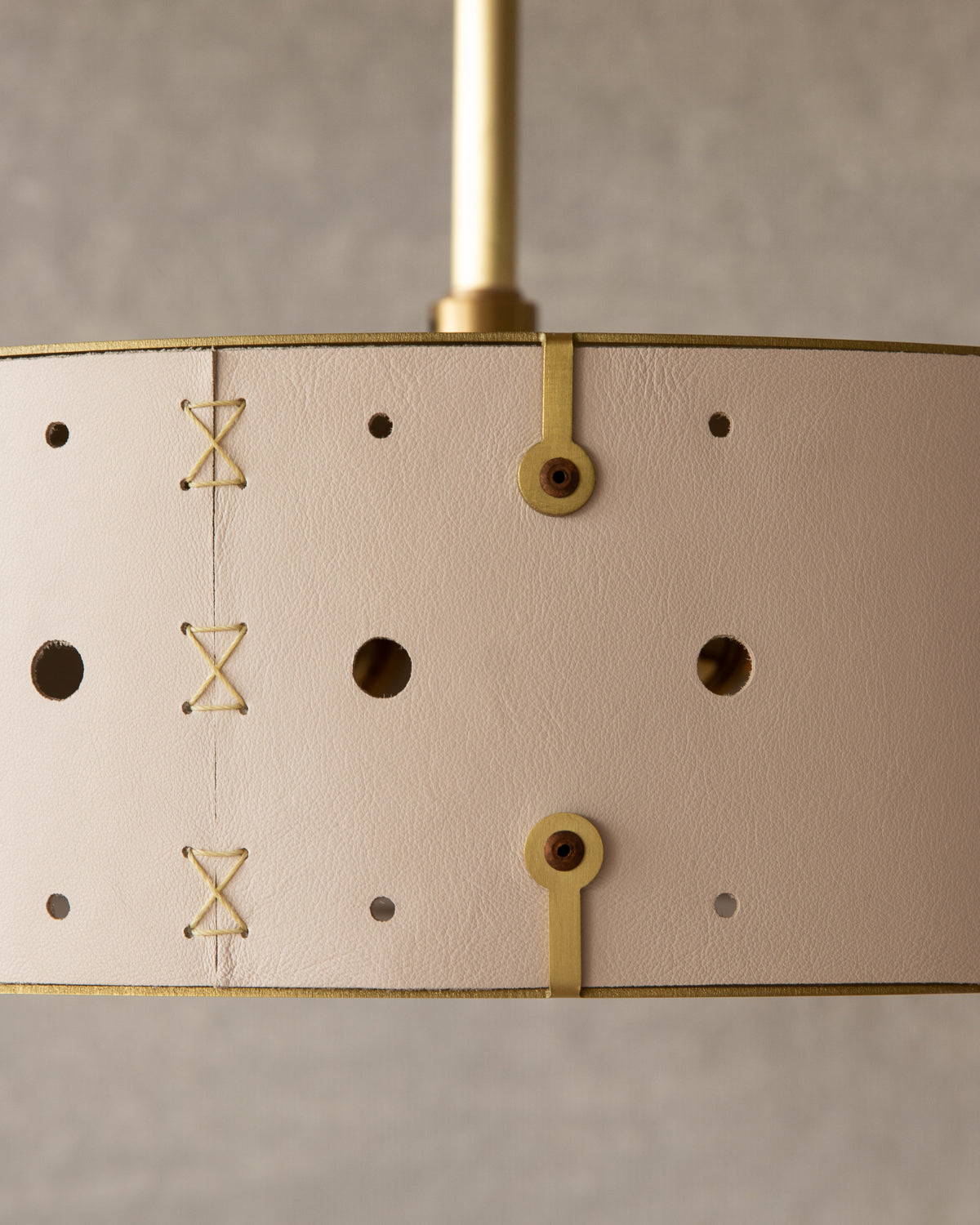 Beautiful satin brass flush mount ceiling fixture with handstitched leather drum shade