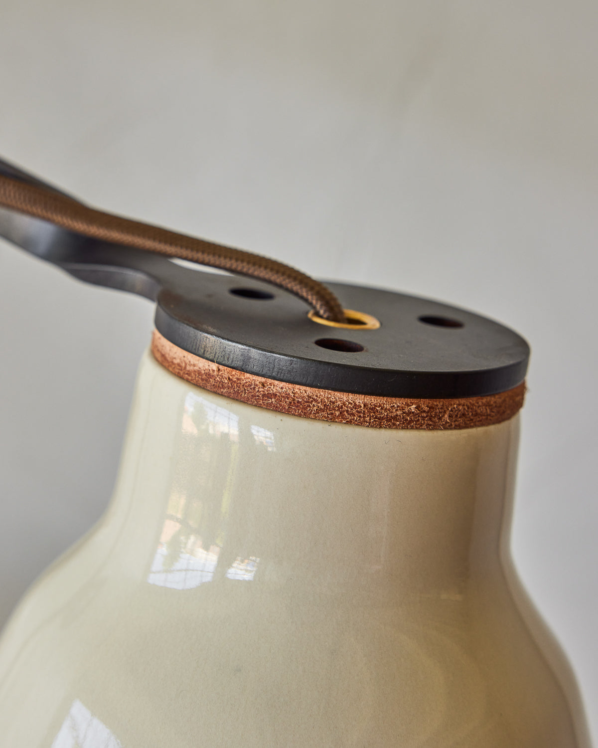 Maple, steel and ceramic wall sconce with articulating arm with glossy white stoneware shade and backplate #color_cream