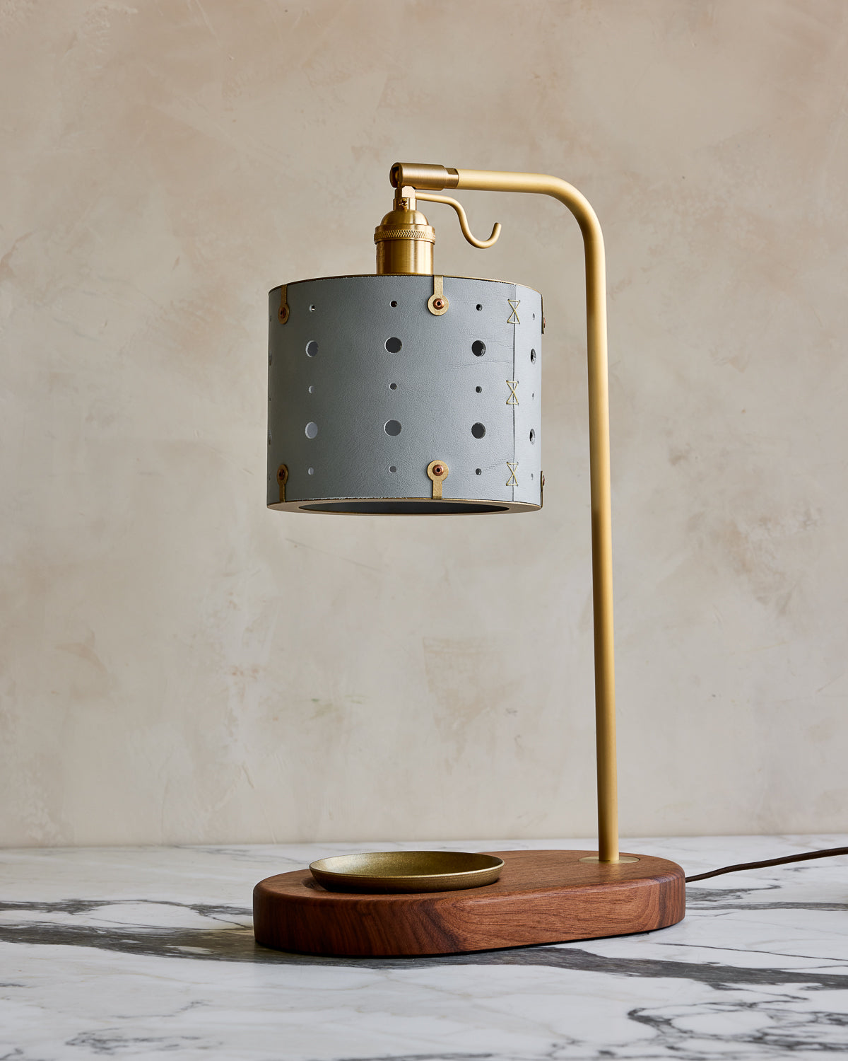 Charming desk lamp with blue handstitched articulating leather shade, warm brass and walnut wood with brass dish