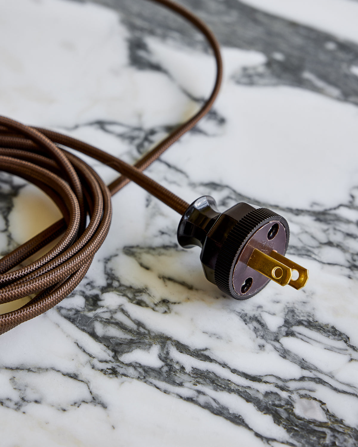 Brass table lamp with walnut base and blue leather shade