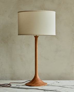 Large Trumpet table lamp with natural finish and ivory drum shade