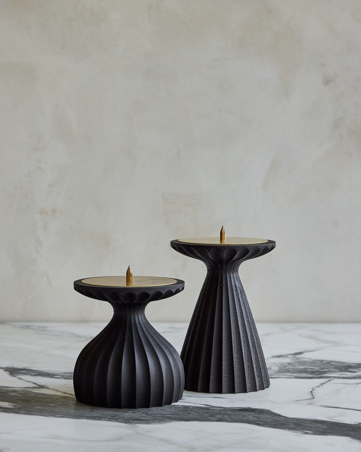 Pair of delicately grooved pillar candle holders in dark wash maple wood