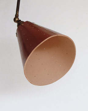 Large articulating black plug in wall sconce with tan handstitched cone leather shade