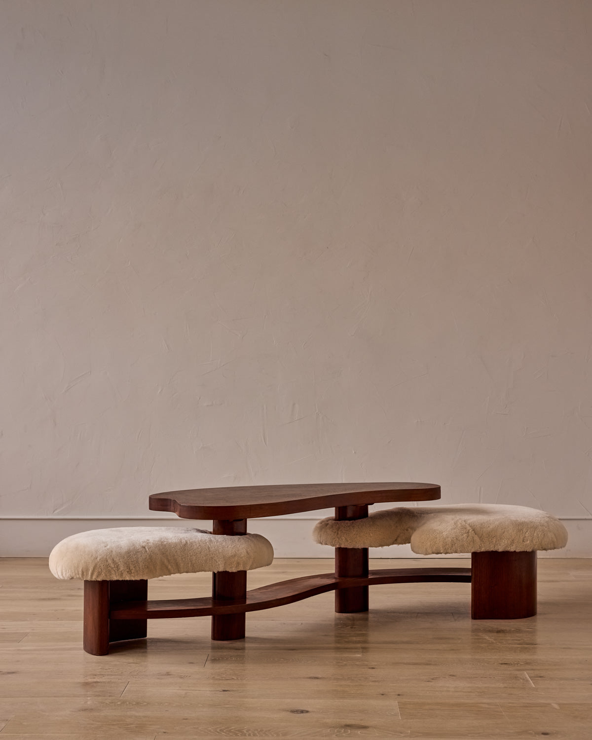Sculptural Table with Attached Shearling Seating