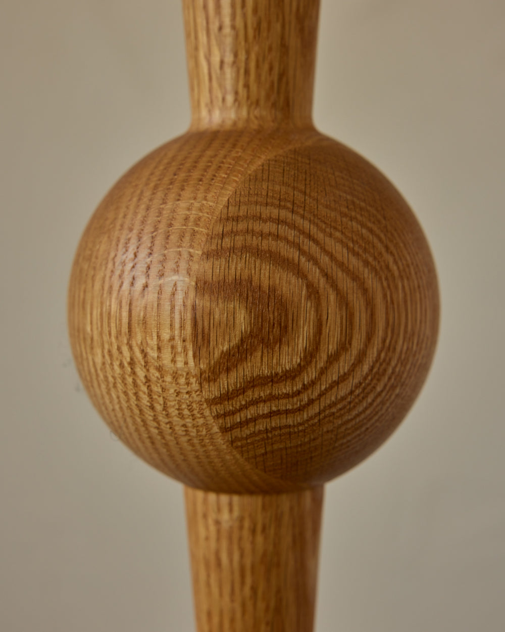 Tall sculptural solid red oak floor lamp with barbell design in natural finish with ivory linen drum shade, best seller, made in the USA 
#color_natural red oak