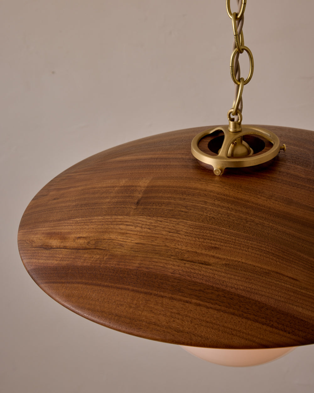 Large pendant light with oversized clear glass globe and decorative wooden clear maple shade with brass chain  #shade-finish_black walnut #globe_white glass #cord-color_beige