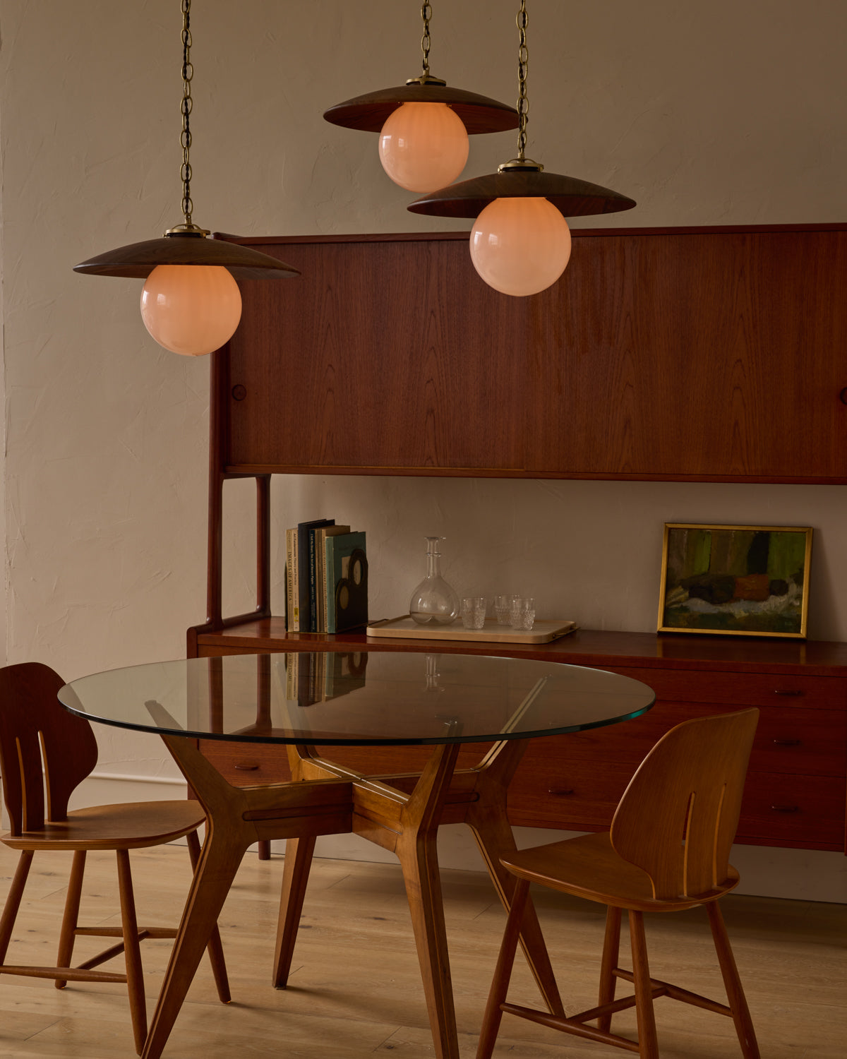 Large pendant light with oversized clear glass globe and decorative wooden clear maple shade with brass chain  #shade-finish_black walnut #globe_white glass #cord-color_brown