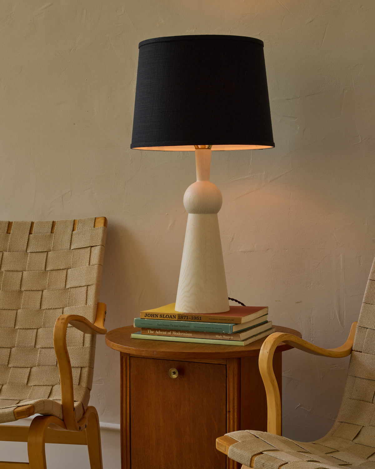 White wash solid wood table lamp with gently tapered body and black linen  shade #wood-finish_white wash red oak #shade-color_black linen