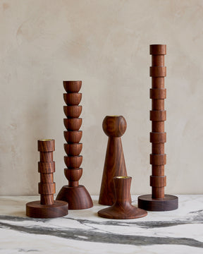 Collection of wooden black walnut candle holders 