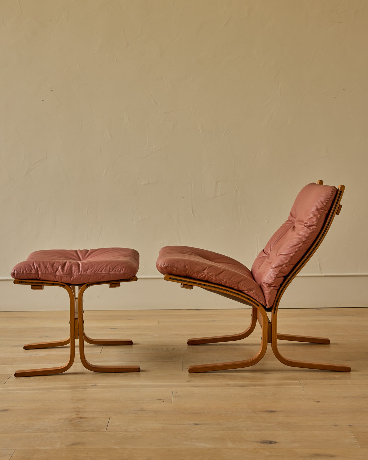 Pair of Leather Siesta Lounge Chairs Ottomans by Ingmar Relling fo