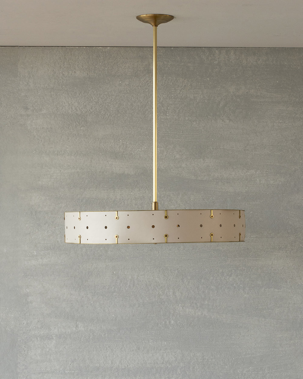 Beautiful satin brass ceiling pendant fixture with handstitched leather drum shade and customizable drop
#leather-color_dogwood