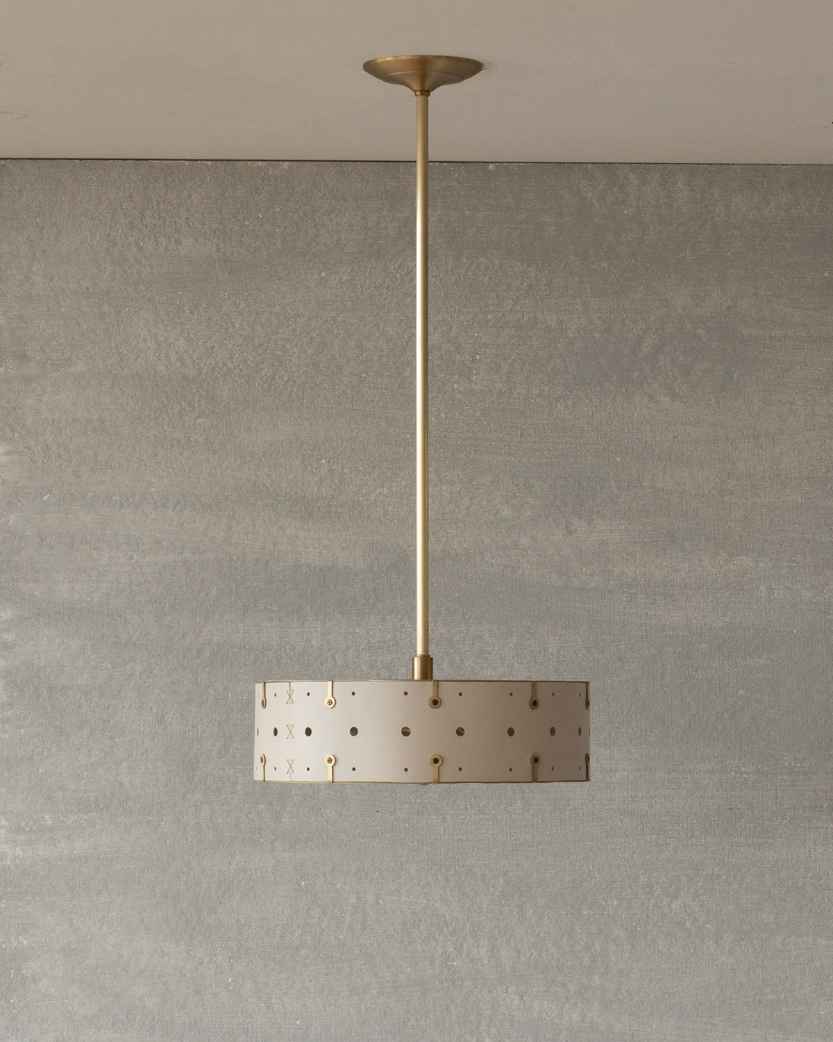 Beautiful satin brass ceiling pendant fixture with handstitched leather drum shade and customizable drop
#leather-color_dogwood 