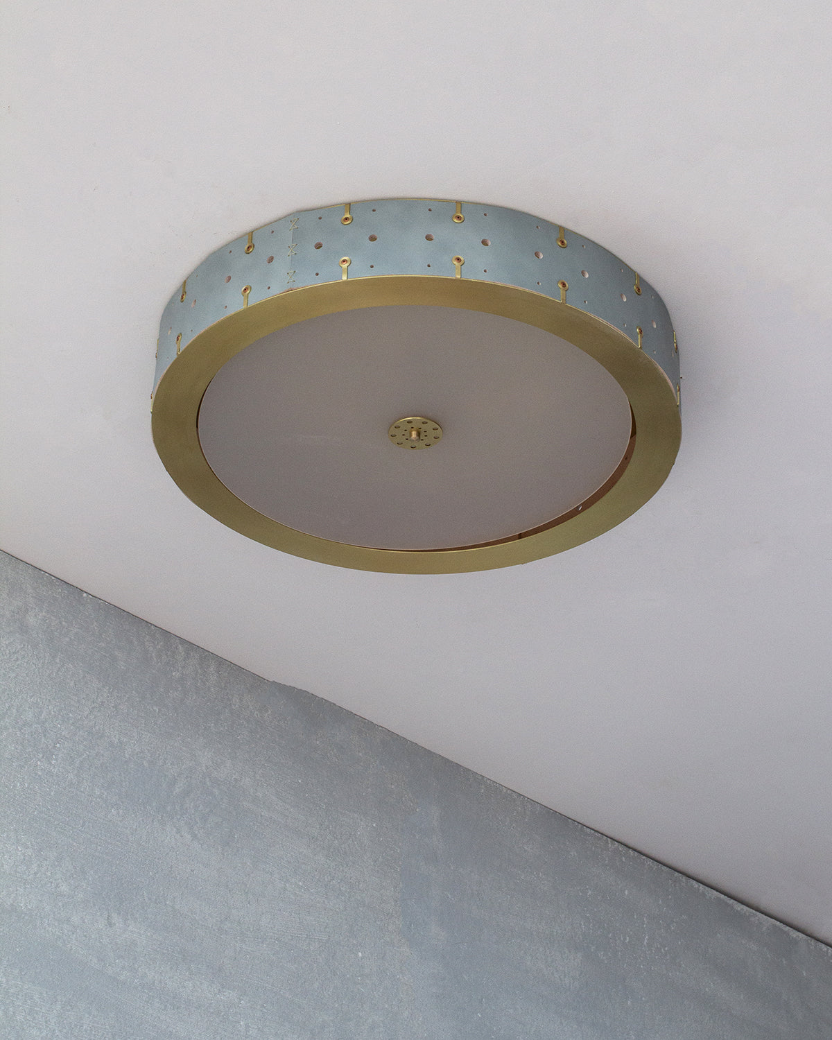 Beautiful satin brass flush mount ceiling fixture with handstitched leather drum shade #leather-color_cloud blue