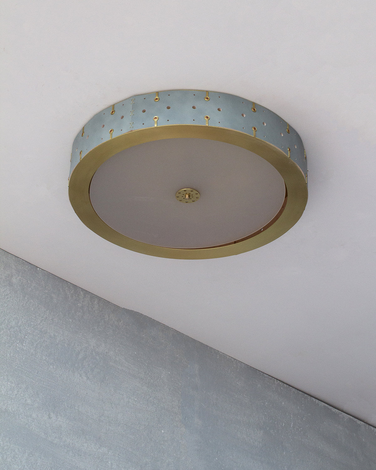 Beautiful satin brass flush mount ceiling fixture with handstitched leather drum shade