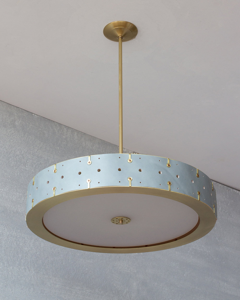 Beautiful satin brass ceiling pendant fixture with handstitched leather drum shade and customizable drop
#leather-color_cloud-blue 