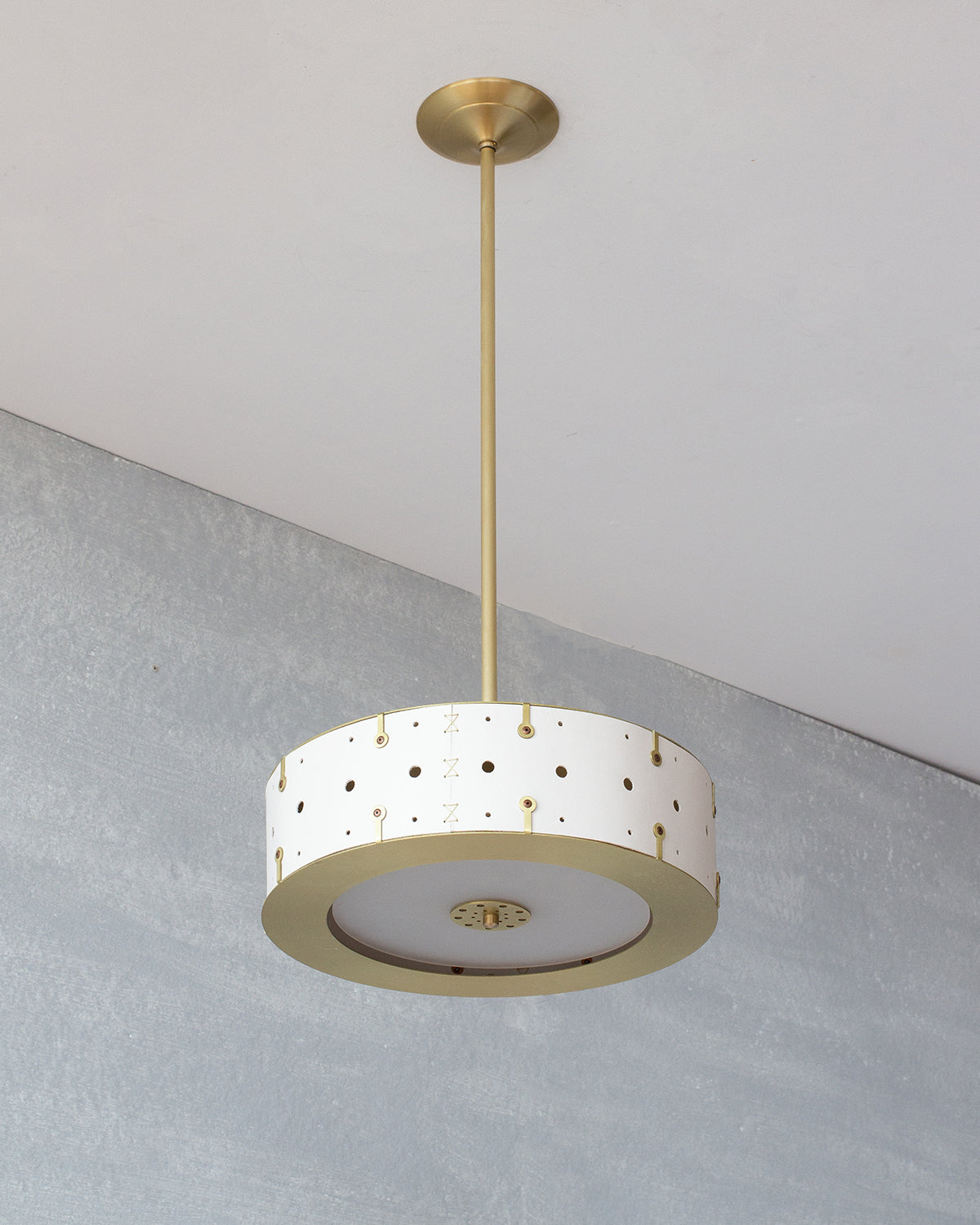 Beautiful satin brass ceiling pendant fixture with handstitched leather drum shade and customizable drop
#leather-color_dogwood 
