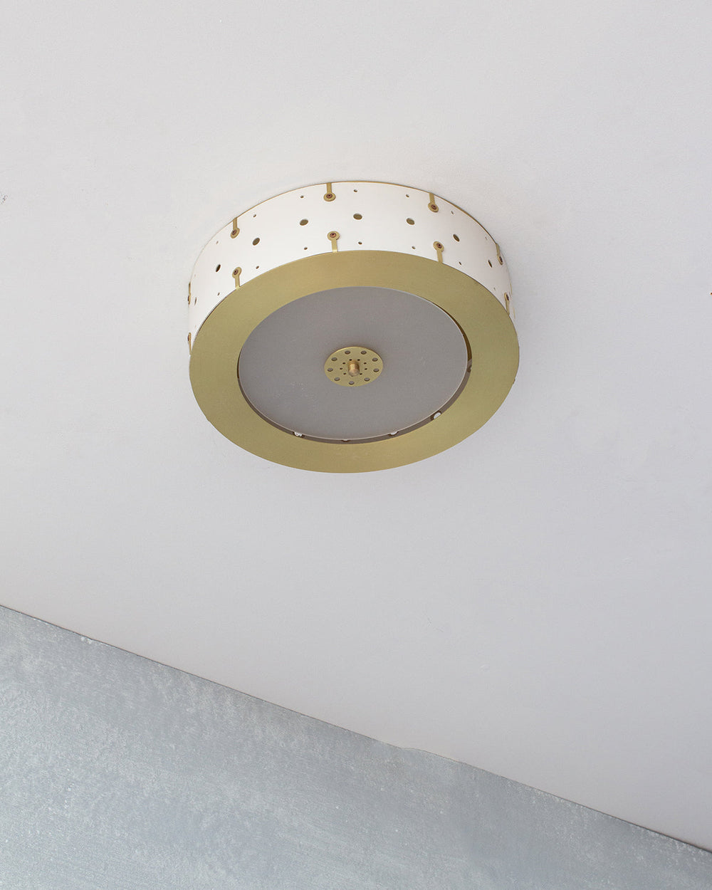 Beautiful satin brass flush mount ceiling fixture with handstitched leather drum shade
