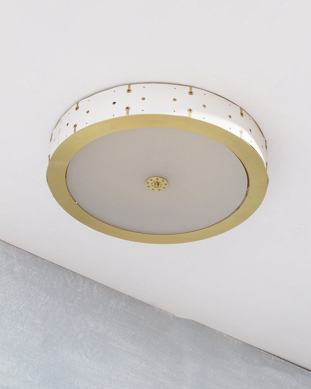 Beautiful satin brass flush mount ceiling fixture with handstitched leather drum shade