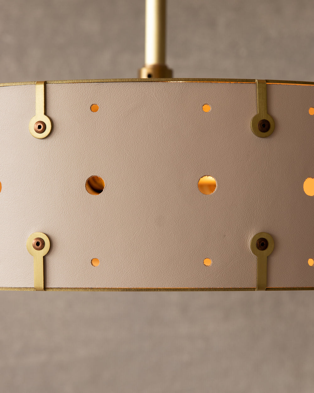 Beautiful satin brass ceiling pendant fixture with handstitched leather drum shade and customizable drop
#leather-color_dogwood
