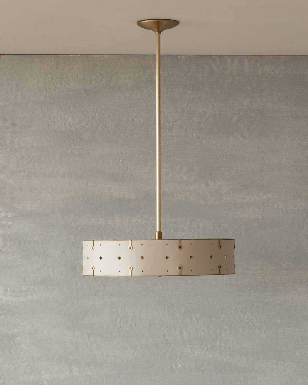 Beautiful satin brass ceiling pendant fixture with handstitched leather drum shade and customizable drop
#leather-color_dogwood