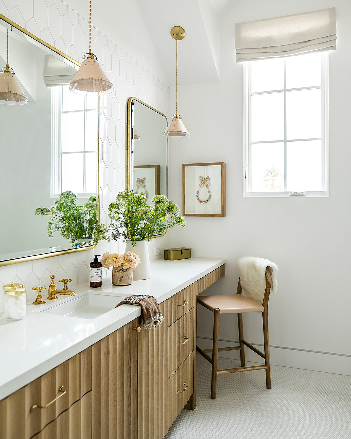 Classic cone pendants with hand-stitched decorative leather shade and glass diffuser hanging over bathroom sink
#color_natural tan