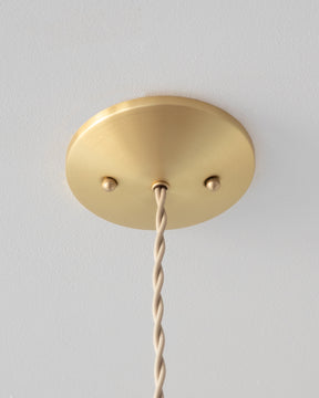 Brass canopy for Charming leather pendant light with blue handstitched shade and brass accents