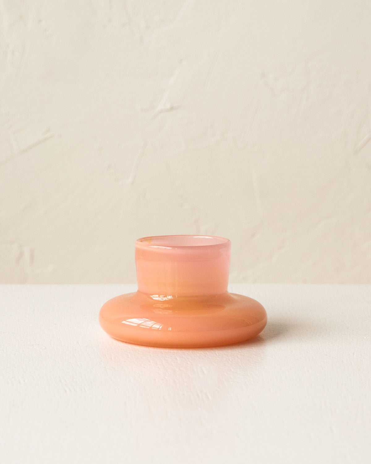Handmade peachy pink glass tea light holder