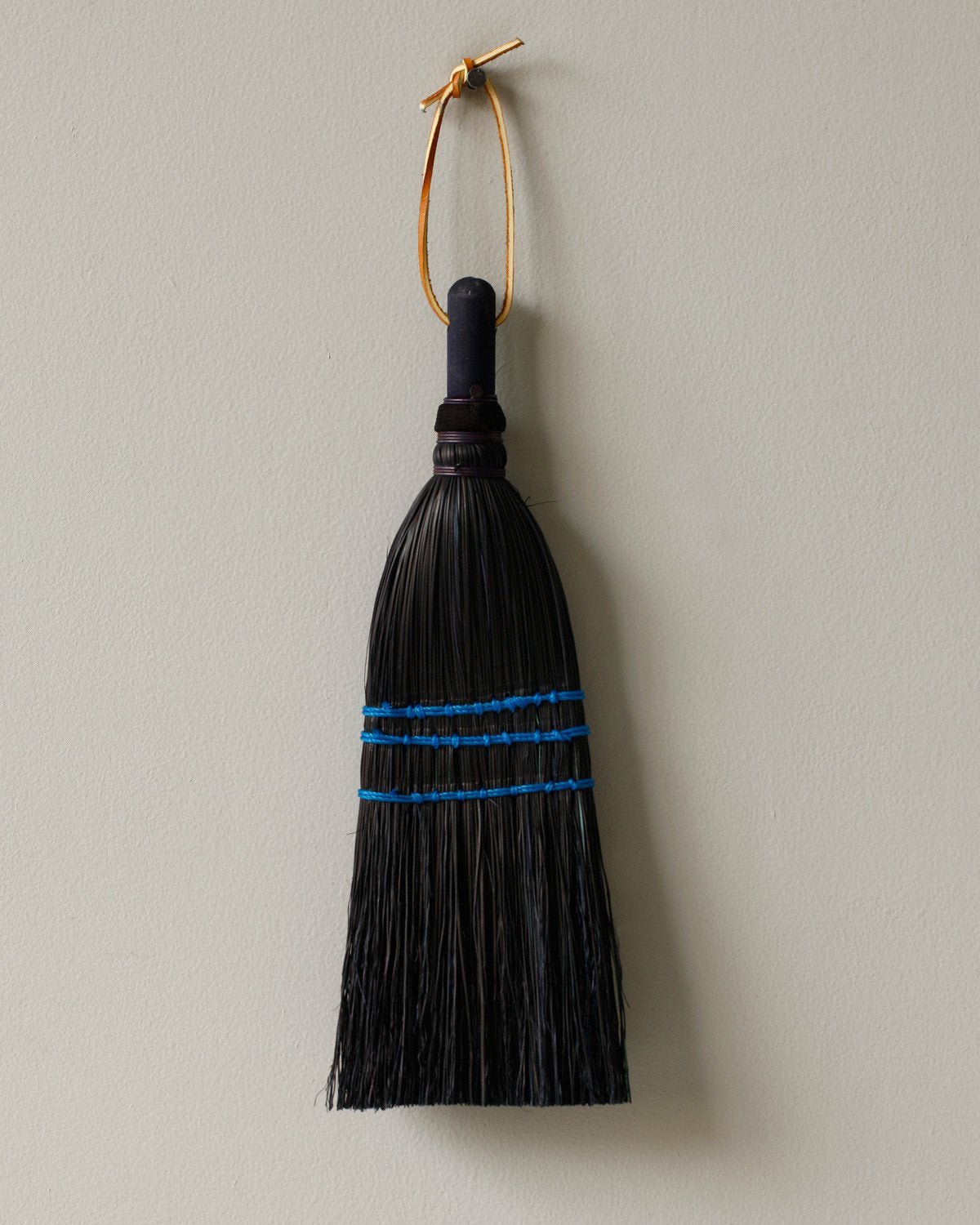 Lostine black whisk broom 