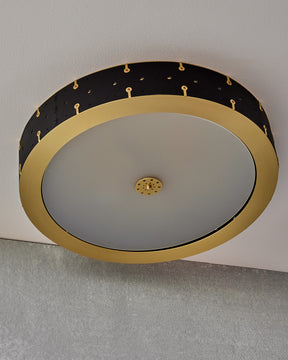 Beautiful satin brass flush mount ceiling fixture with handstitched leather drum shade