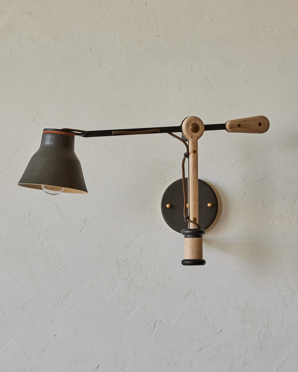 Maple, steel and ceramic wall sconce with articulating arm with matte black stoneware shade #color_almost black