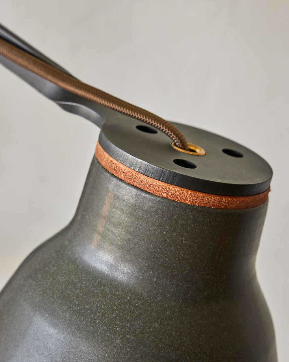 Maple, steel and ceramic wall sconce with articulating arm with matte black stoneware shade #color_almost black