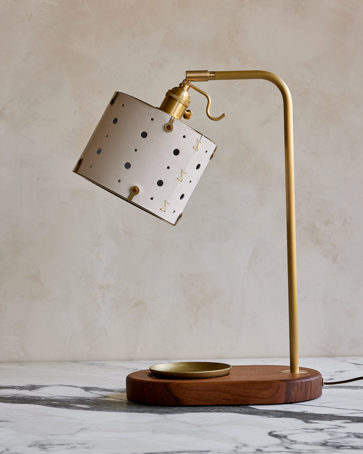 Charming desk lamp with white handstitched articulating leather shade, warm brass and walnut wood with brass dish
