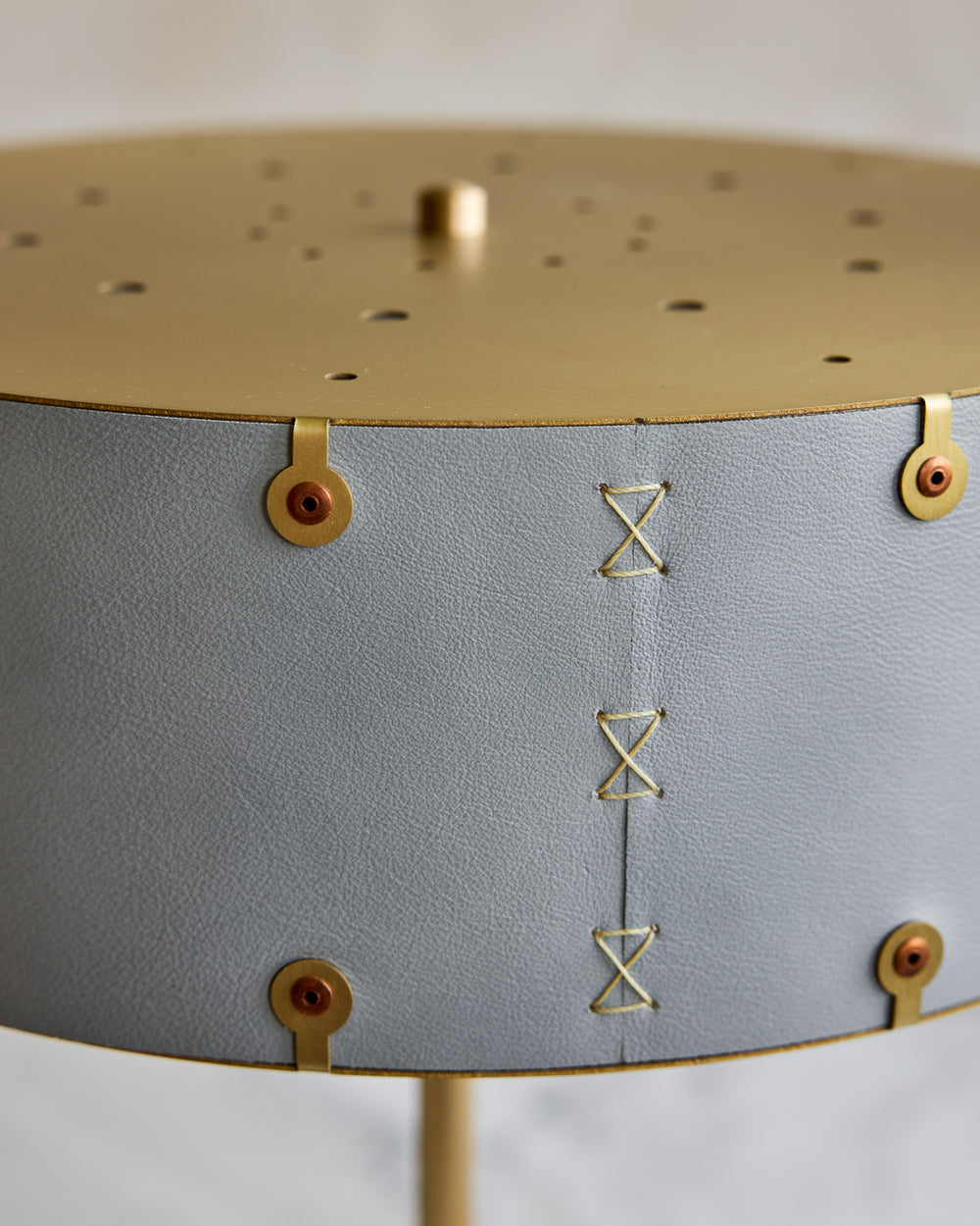 Brass table lamp with walnut base and blue leather shade #color_cloud blue