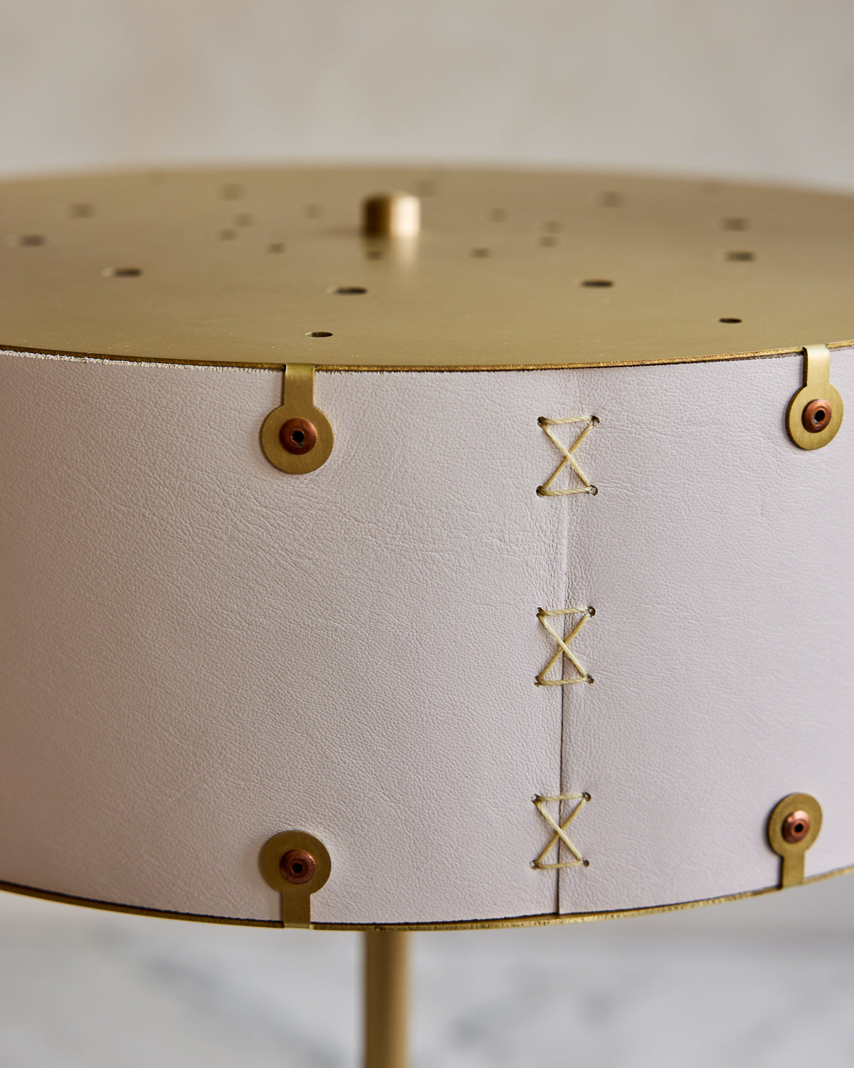 Brass table lamp with walnut base and white leather shade