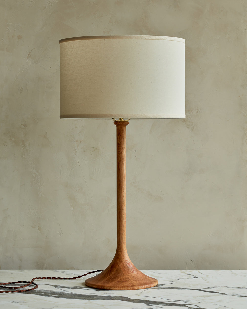 Large Trumpet table lamp with natural finish and ivory drum shade
#wood-finish_natural red oak #shade-color_ivory linen