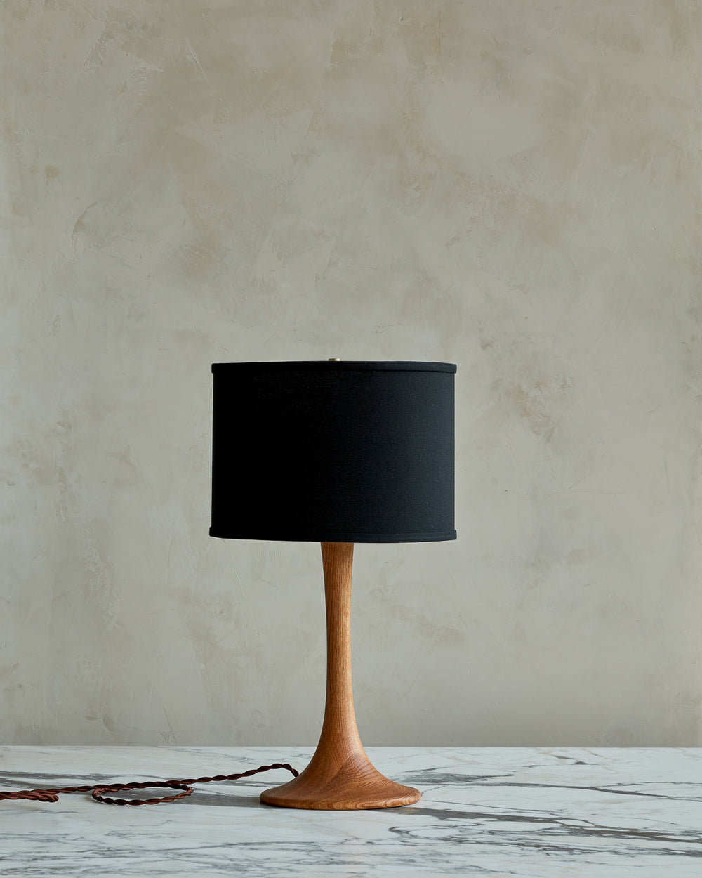 Small Trumpet table lamp with natural finish and black drum shade #wood-finish_natural red oak #shade-color_black linen