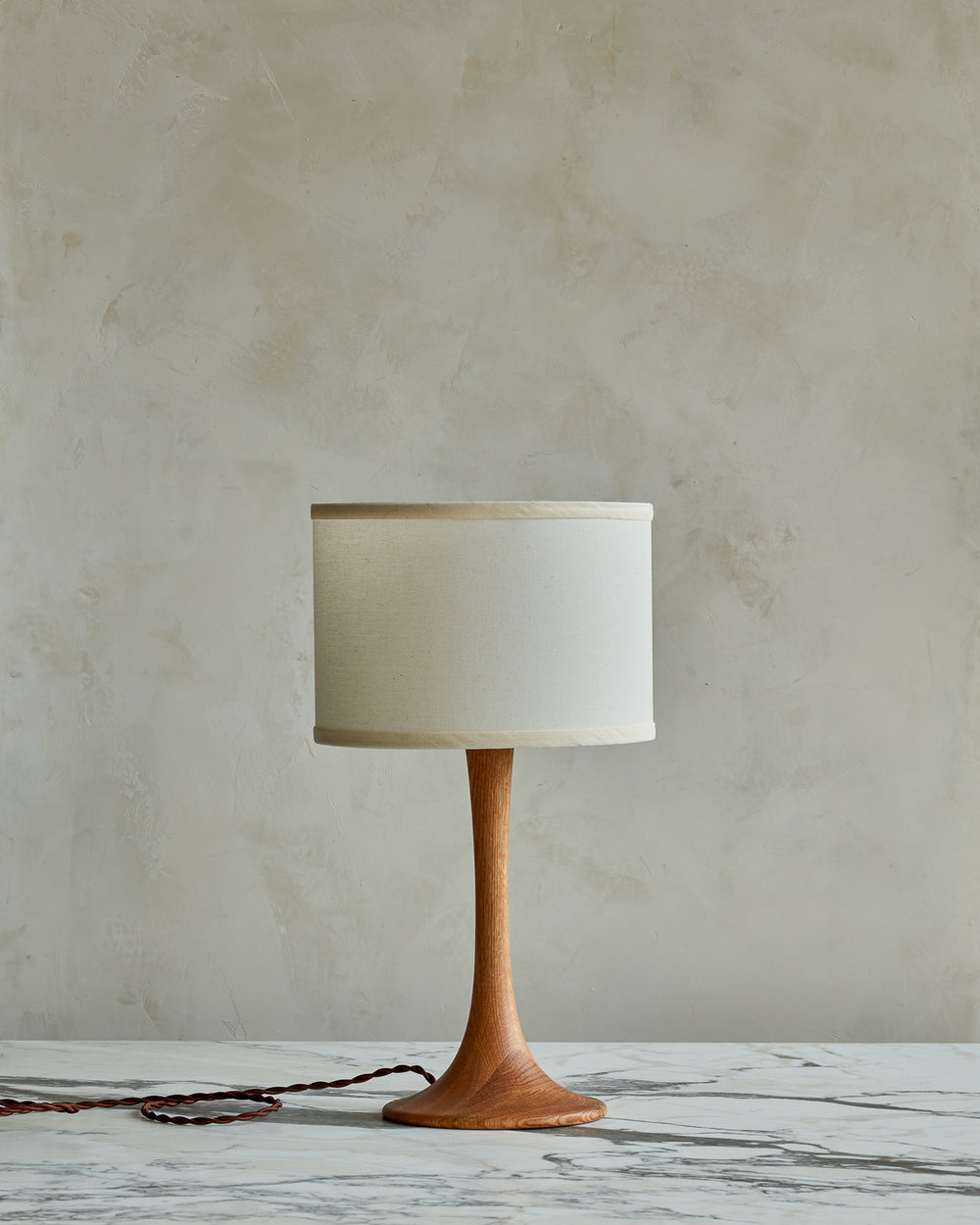 Small Trumpet table lamp with natural finish and ivory drum shade #wood-finish_natural red oak #shade-color_ivory linen